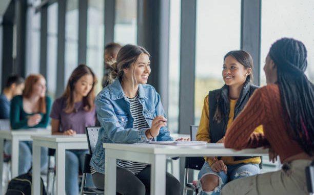 A group of international students applying for fully funded scholarships and free visas to study in Canada